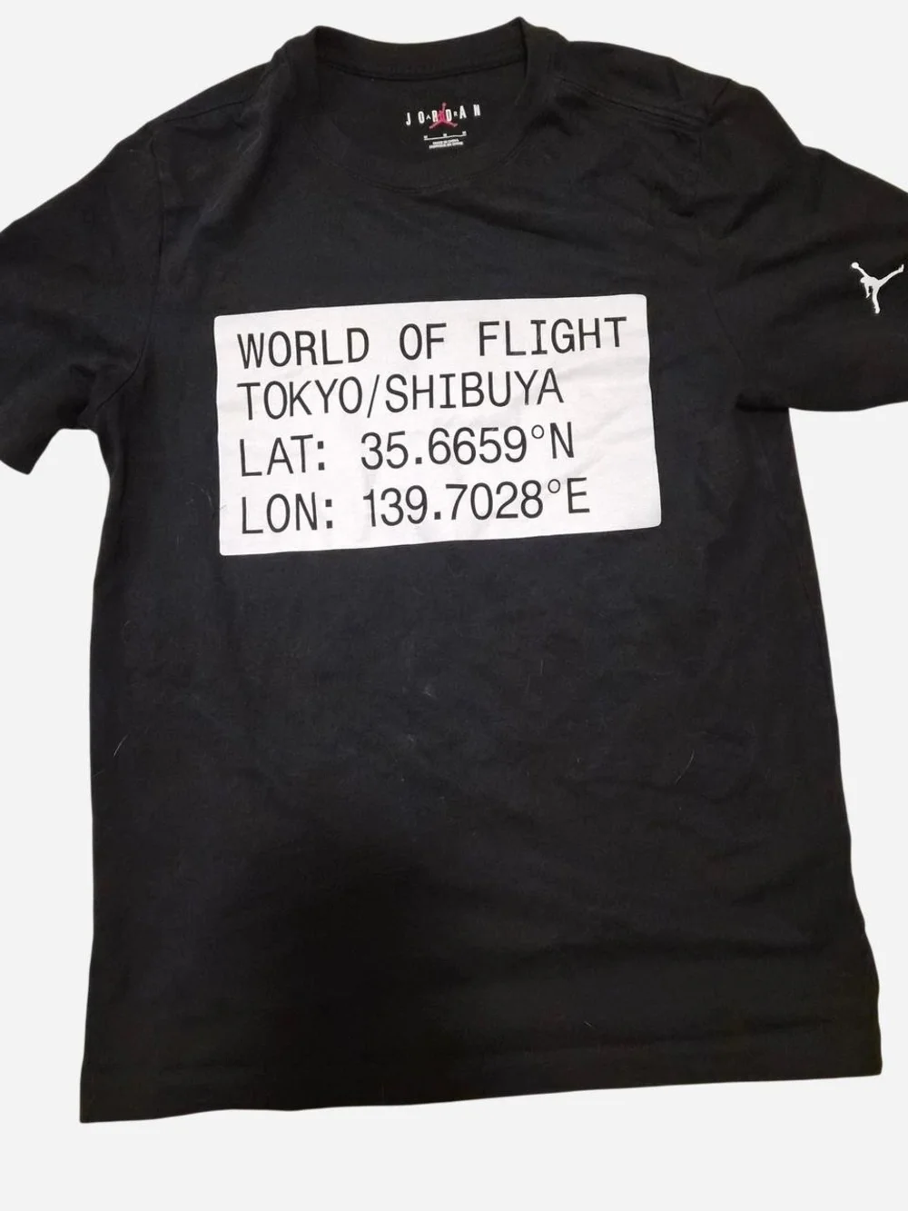 Jordan Black Short Sleeve Tee with White 'World of Flight' Graphic
